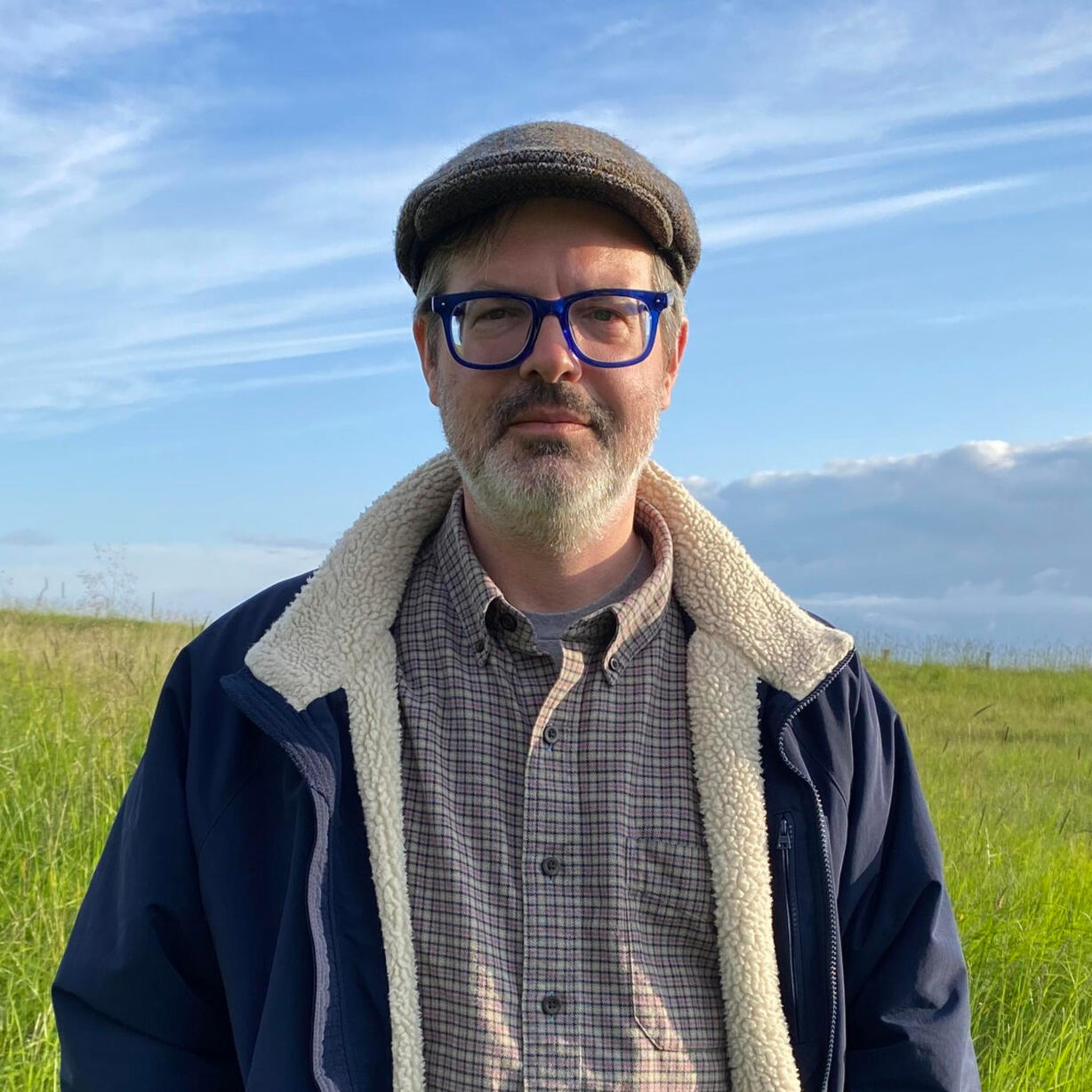 Jacob Strautmann A photo of the author and poet Jacob Strautmann standing in a landscape in Iceland.